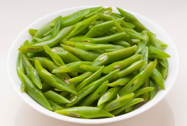 High angle view of green beans in bowl on table