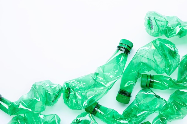 High angle view of green bottles against white background