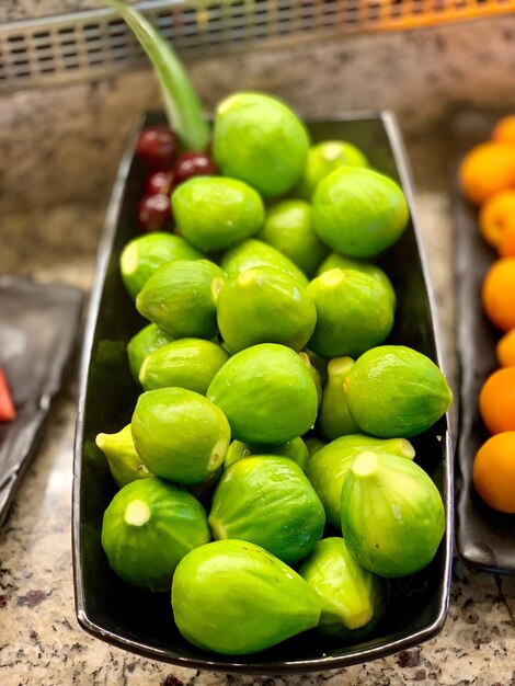 High angle view of green fruits in market