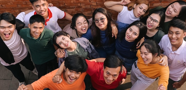 High angle view of group of happy multiethnic people smiling