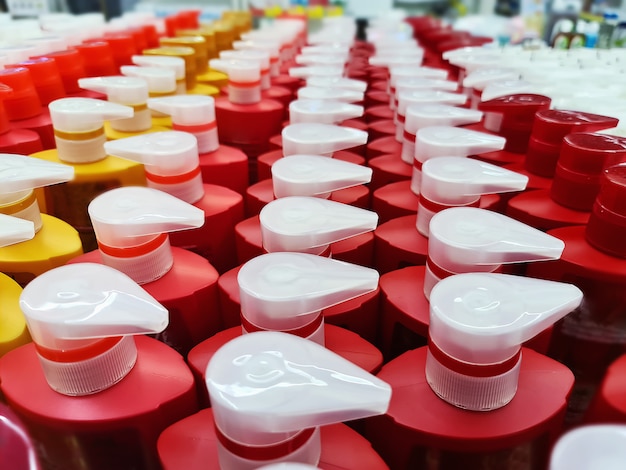 High Angle View of Group of Shampoo Bottles with Dispensing Caps for Sale