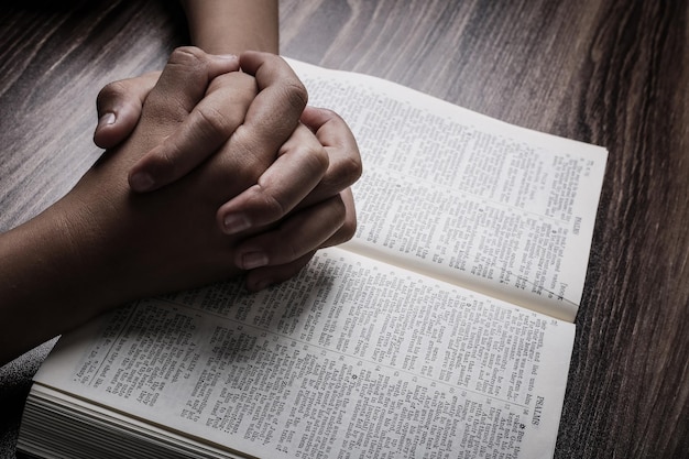 high angle view of hand on book