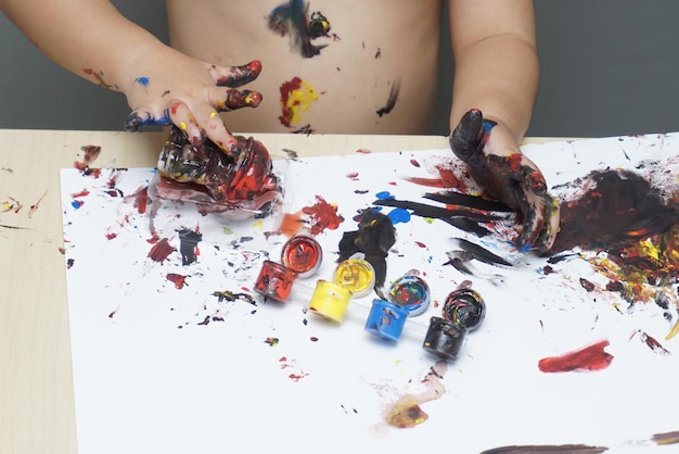 High angle view of hand painting on table