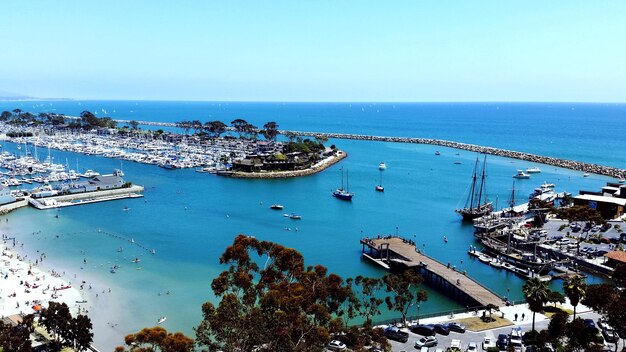 High angle view of harbor by sea against sky