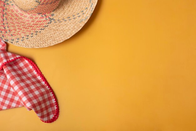 High angle view of hat against yellow background