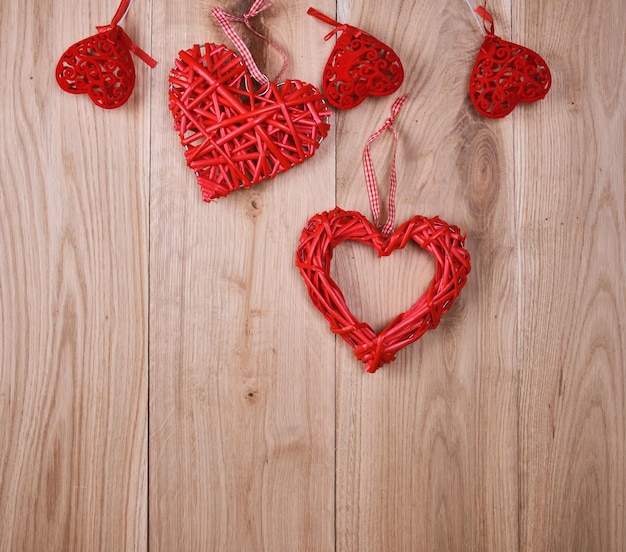 high angle view of heart shape decorations hanging on wood