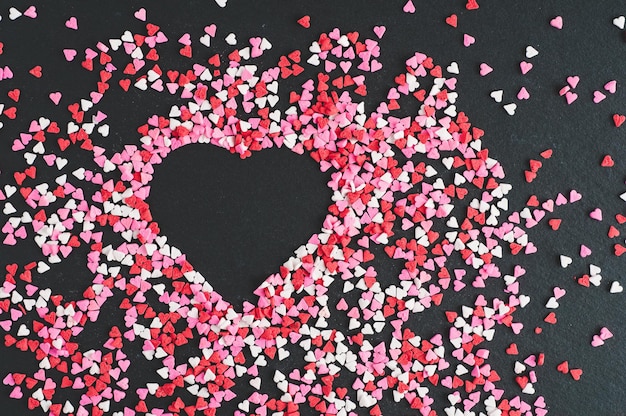 High angle view of heart shape made with decoration on table