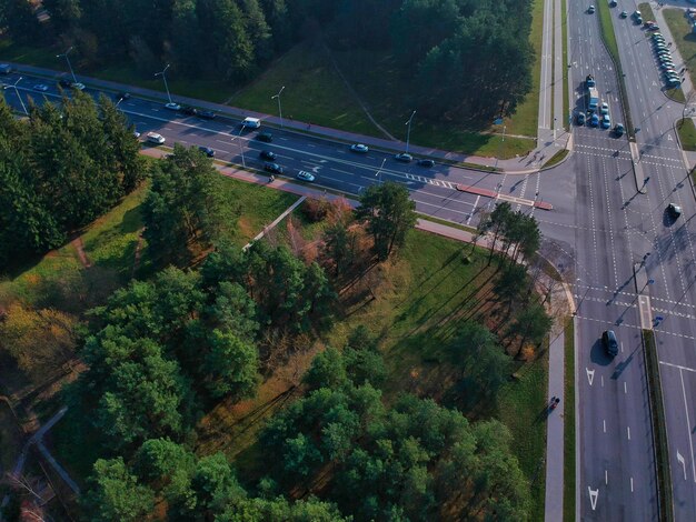 High angle view of highway amidst trees in city