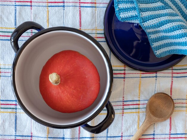 High angle view of hokkaido pumpkin in cooking pot