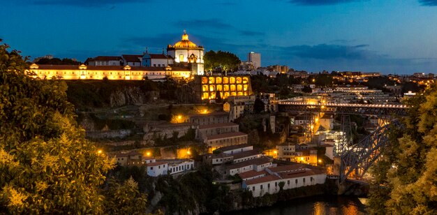 High angle view of illuminated buildings in city at night