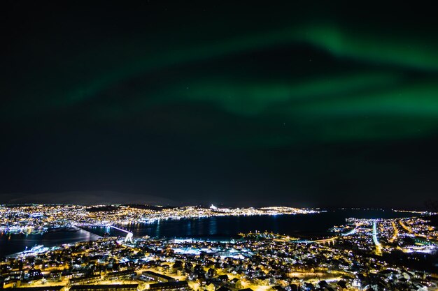 Photo high angle view of illuminated buildings in city at night