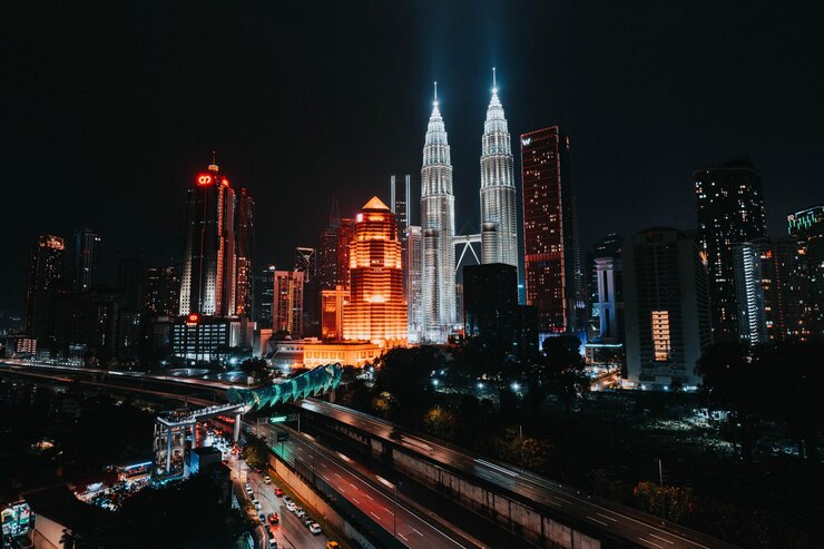 Photo high angle view of illuminated buildings in city at night