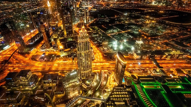 Photo high angle view of illuminated buildings in city at night