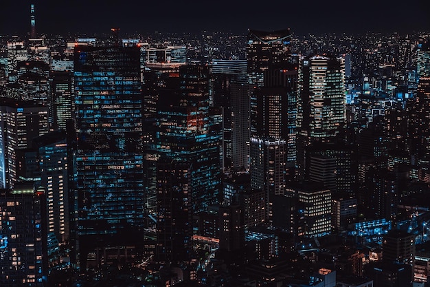 Photo high angle view of illuminated buildings in city at night