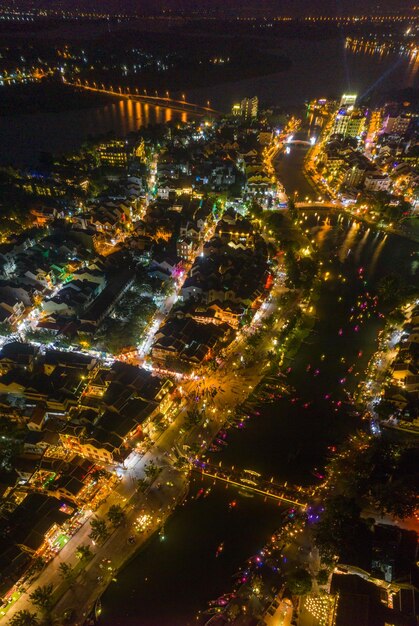 Photo high angle view of illuminated buildings in city at night