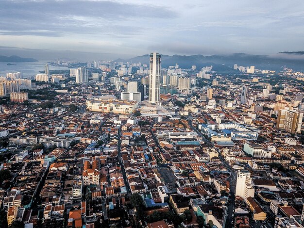 High angle view of illuminated city buildings against sky