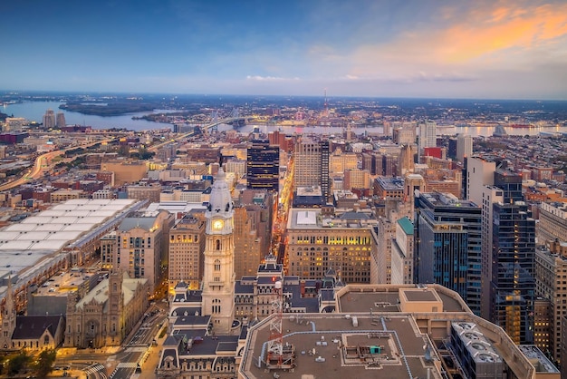 High angle view of illuminated city buildings against sky