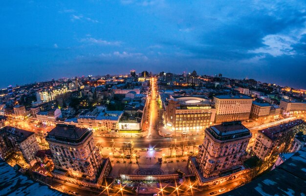 High angle view of illuminated city buildings at night