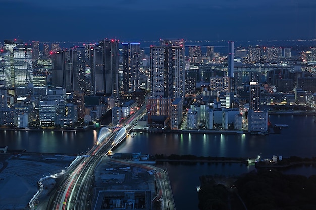 high angle view of illuminated city at tokyo shiodome night