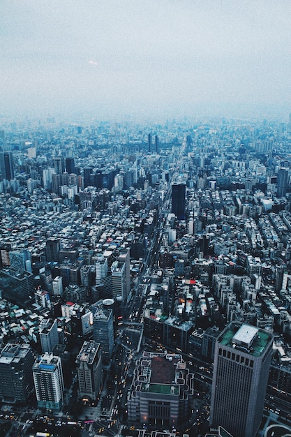 High angle view of illuminated cityscape against sky