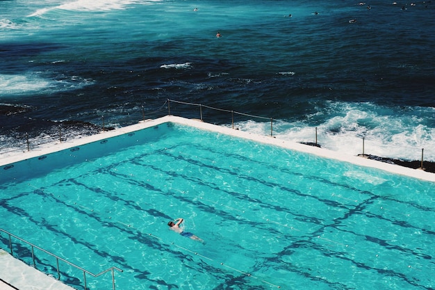 High angle view of infinity pool by sea