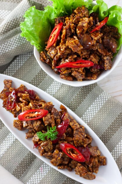 High angle view of kering tempe or sweet crunchy tempeh served on table