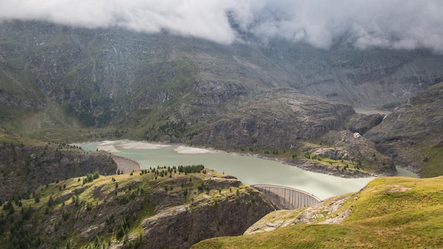 high angle view of lake amidst majestic mountains