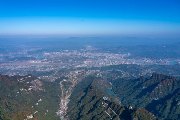 High angle view of landscape against blue sky