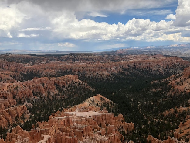 Photo high angle view of landscape against cloudy sky