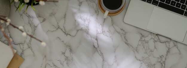 High angle view of laptop and book on table