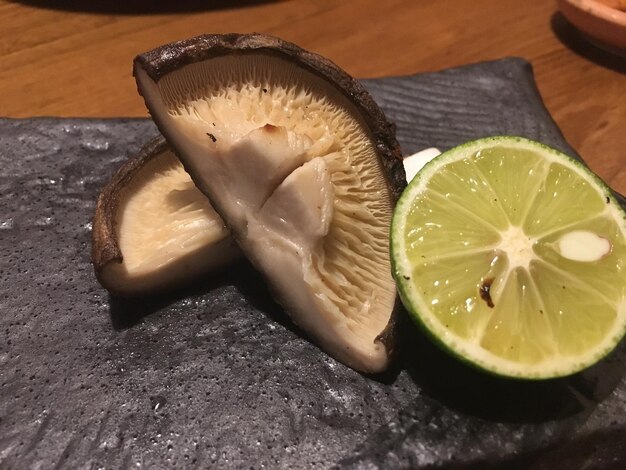 High angle view of lemon slice on table