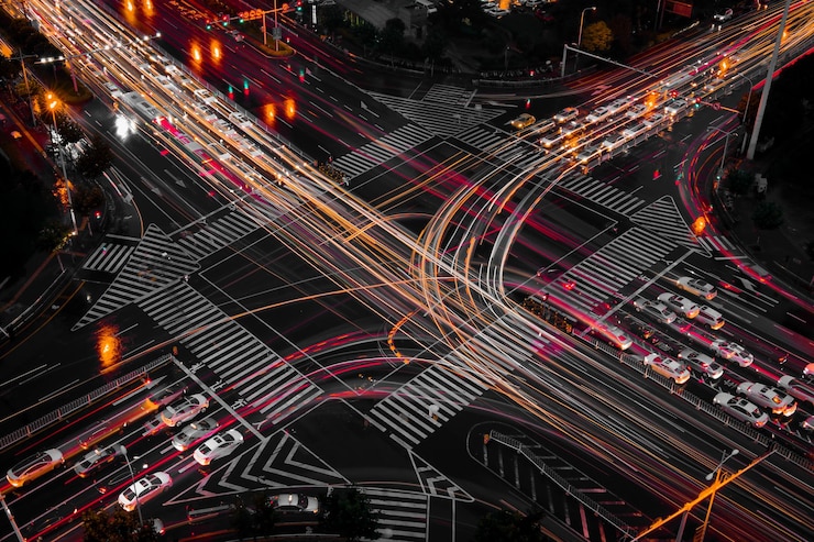 Photo high angle view of light trails on city street at night