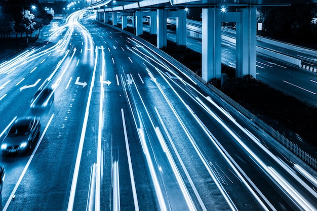 High angle view of light trails on city street