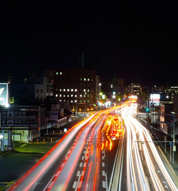 Photo high angle view of light trails on city street