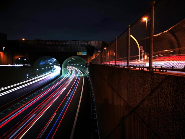 Photo high angle view of light trails on road at night