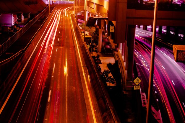 Photo high angle view of light trails on road at night