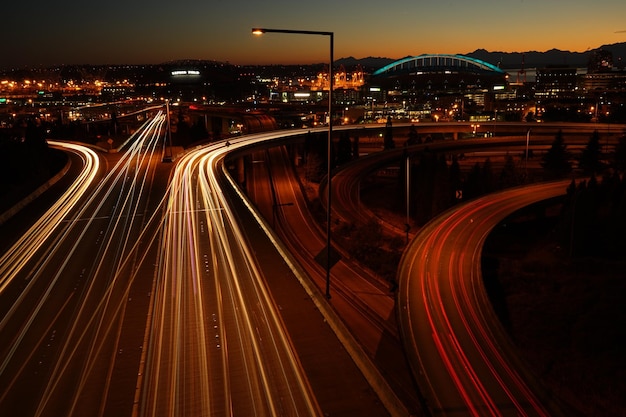 high angle view of light trails on street at dusk