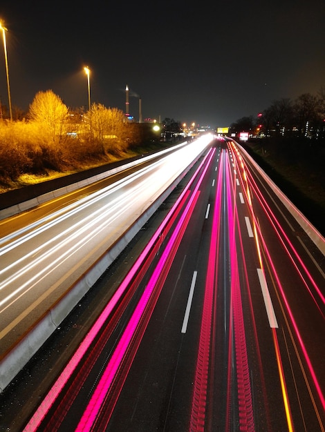 High angle view of light trails on street at night