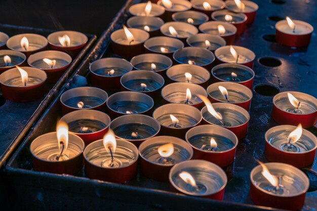 Photo high angle view of lit tea light candles and flame