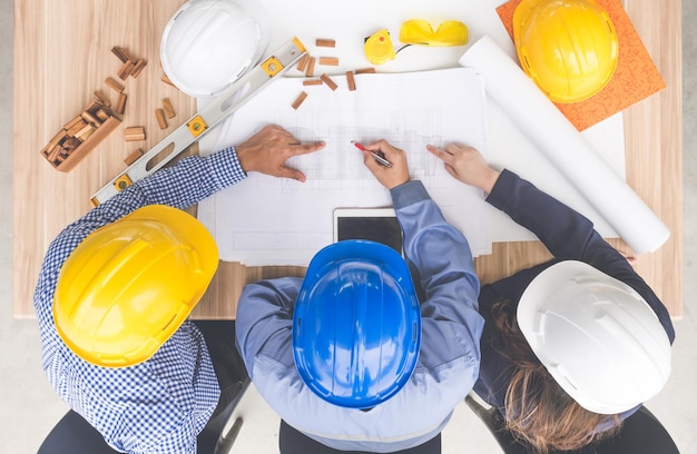 High angle view of man holding food on table