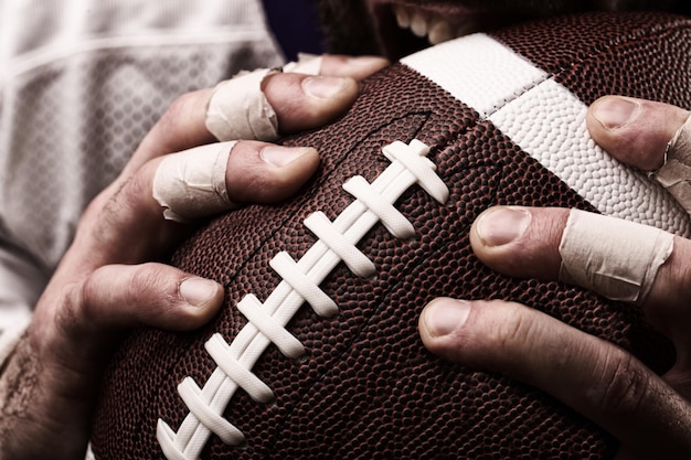 High angle view of man holding rugby ball