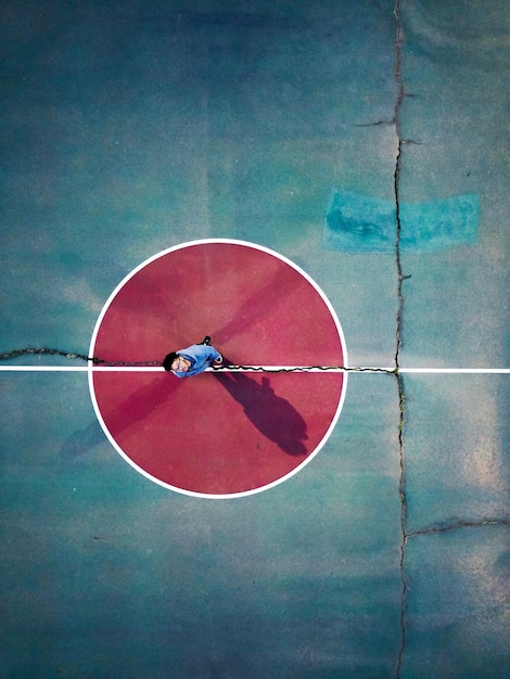 high angle view of man standing on road