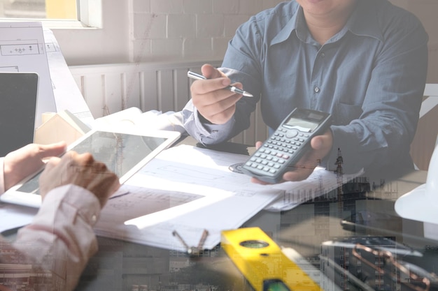 High angle view of man using smart phone on table