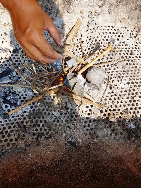 High angle view of man working on metal