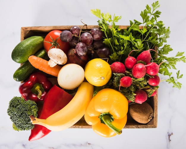 High angle view of many fresh vegetables in container