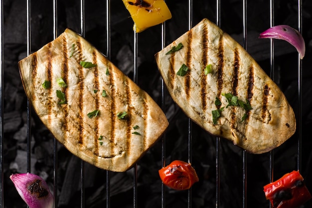 High angle view of meat on barbecue grill