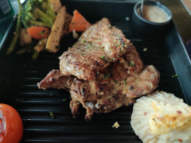 High angle view of meat on barbecue grill