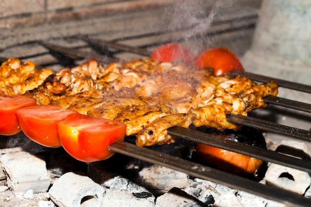 High angle view of meat on barbecue grill