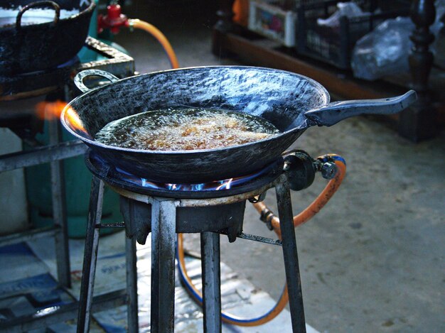 High angle view of meat on barbecue grill