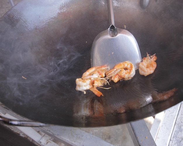 Photo high angle view of meat cooking on barbecue grill